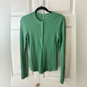 American Eagle Outfitters green waffle-knit shirt.